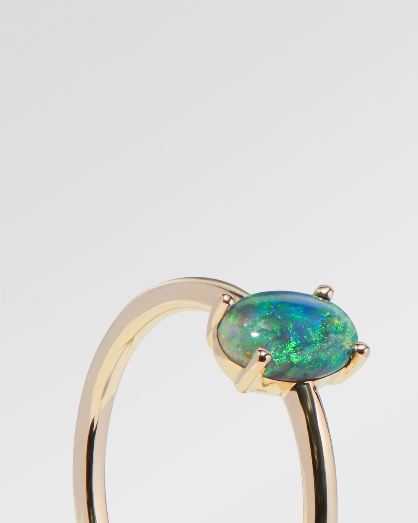 0.60ct Orange, Green Opal Ring