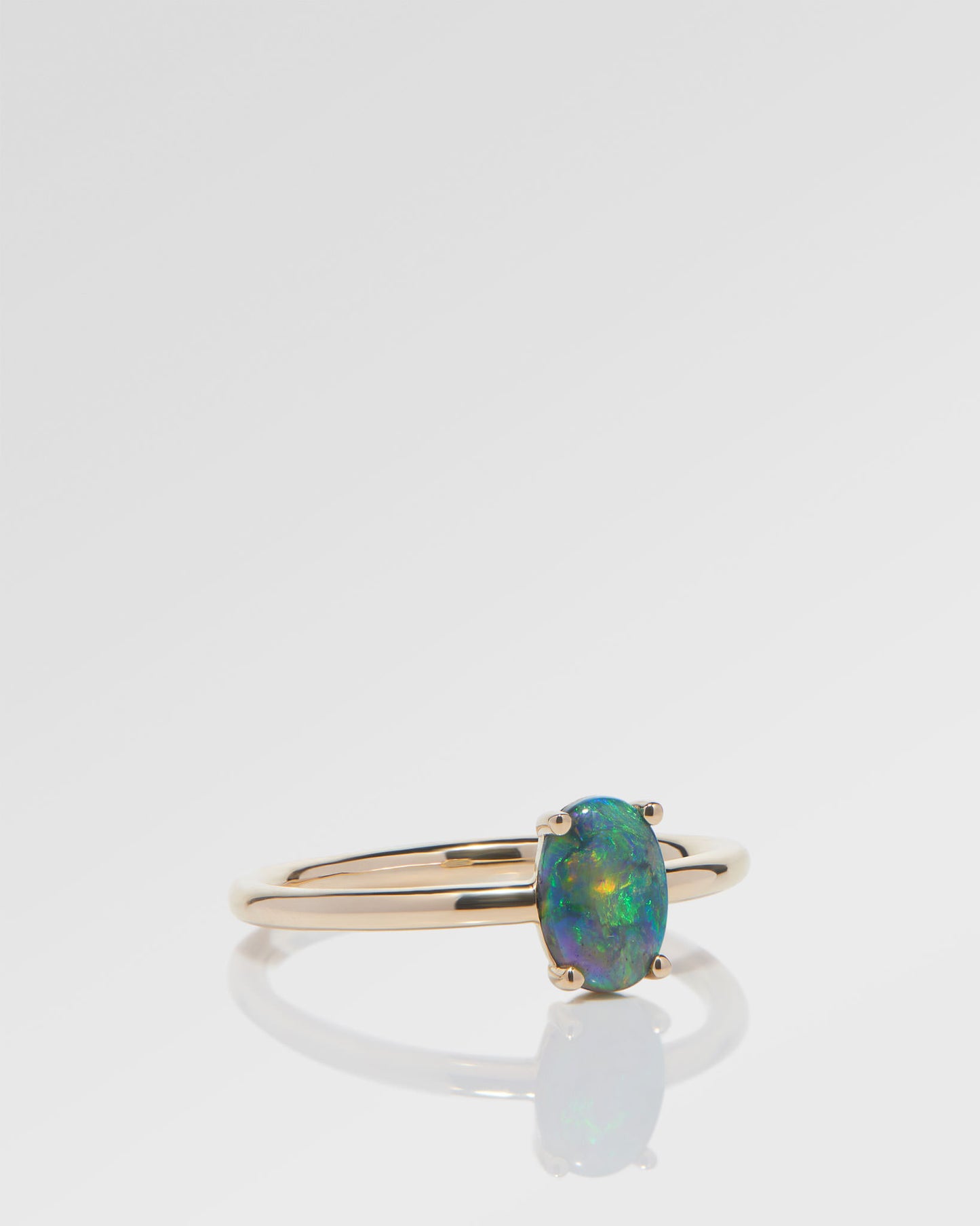 0.60ct Orange, Green Opal Ring