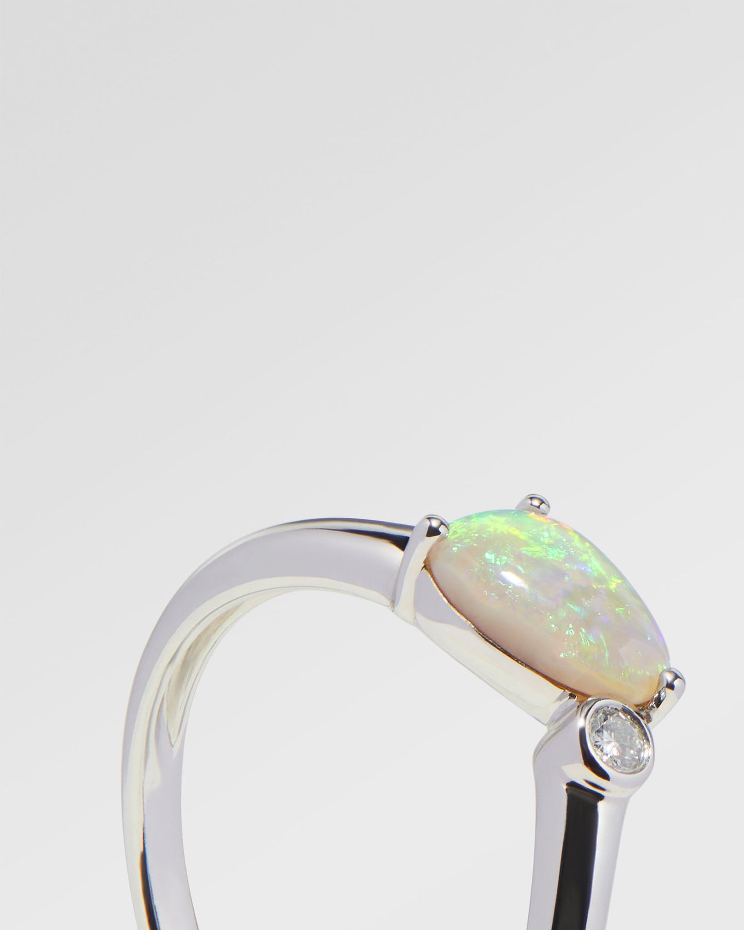 0.54ct Orange, Green Opal Ring