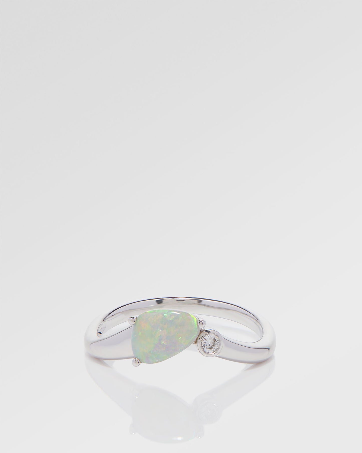 0.54ct Orange, Green Opal Ring