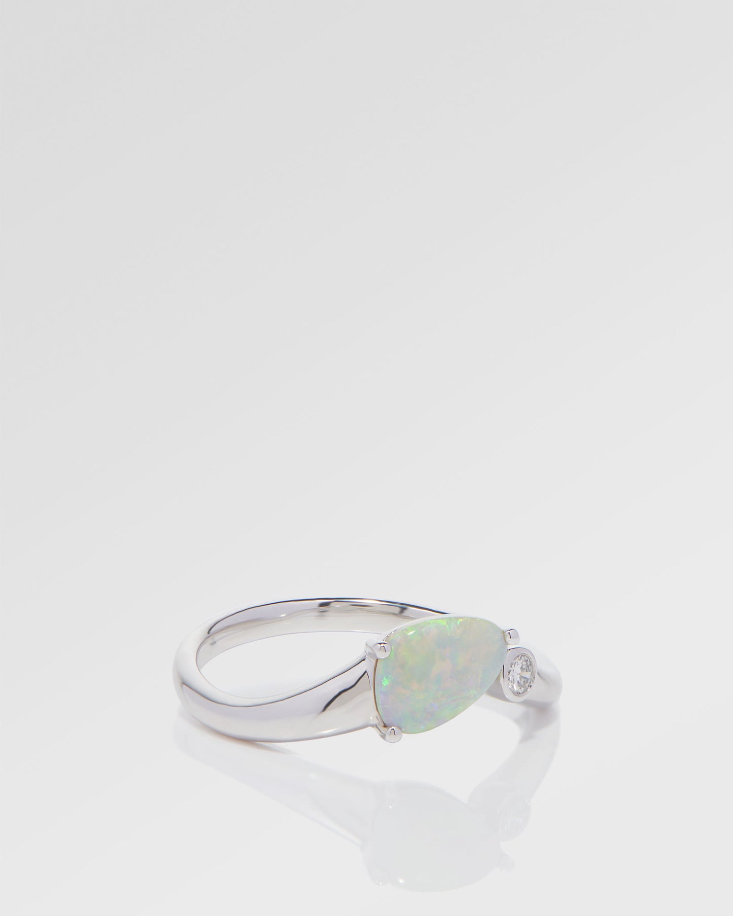 0.54ct Orange, Green Opal Ring