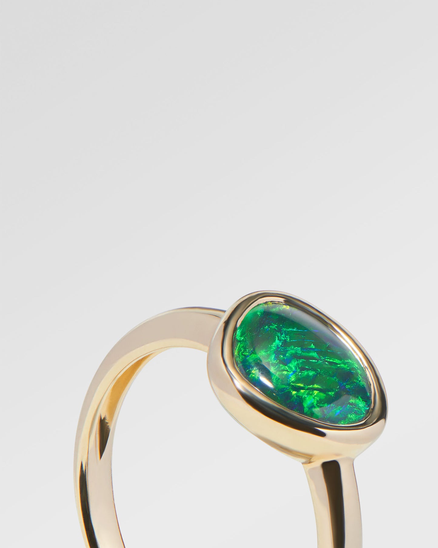 1.17ct Orange, Green Opal Ring