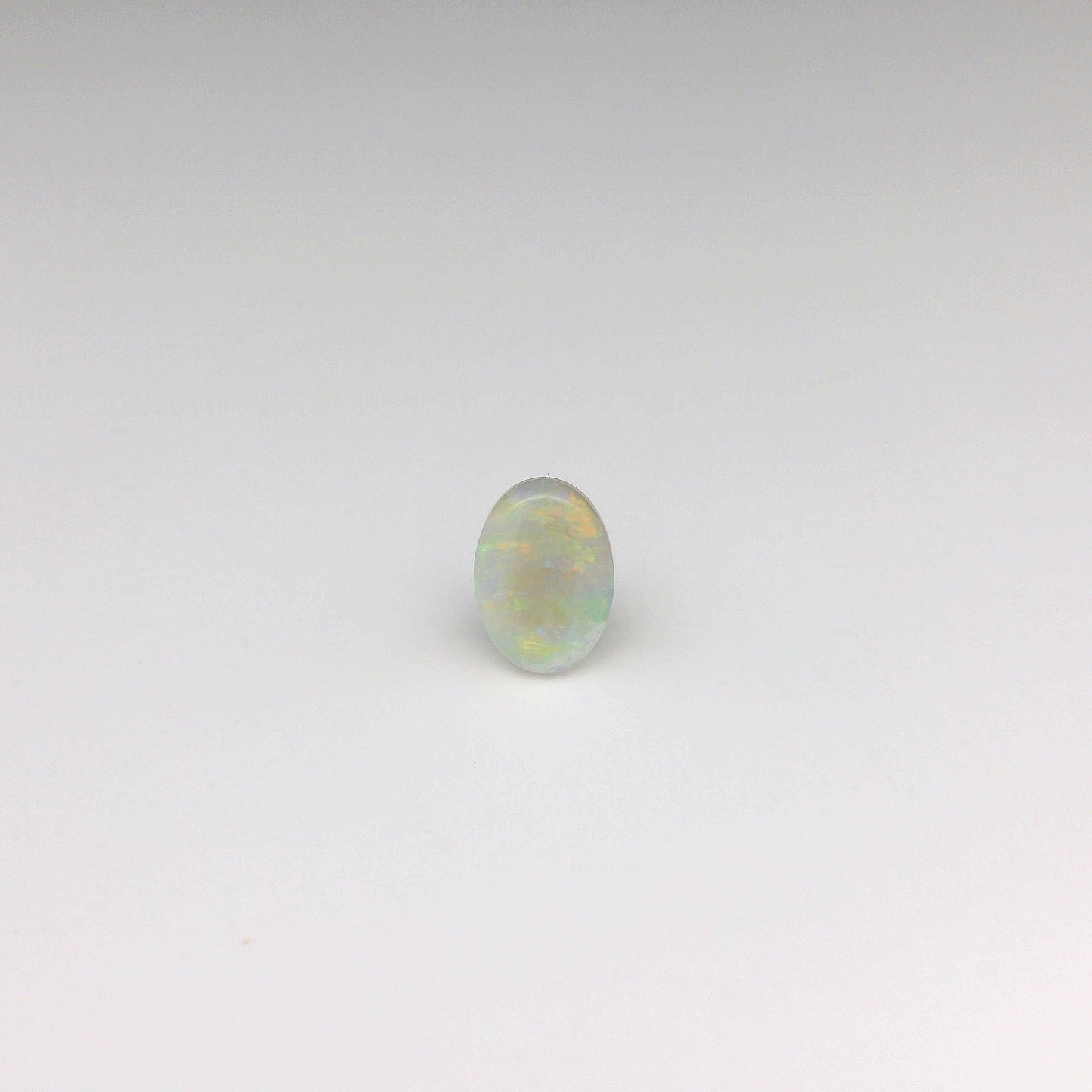 0.80ct Green, Orange Opal Gemstone