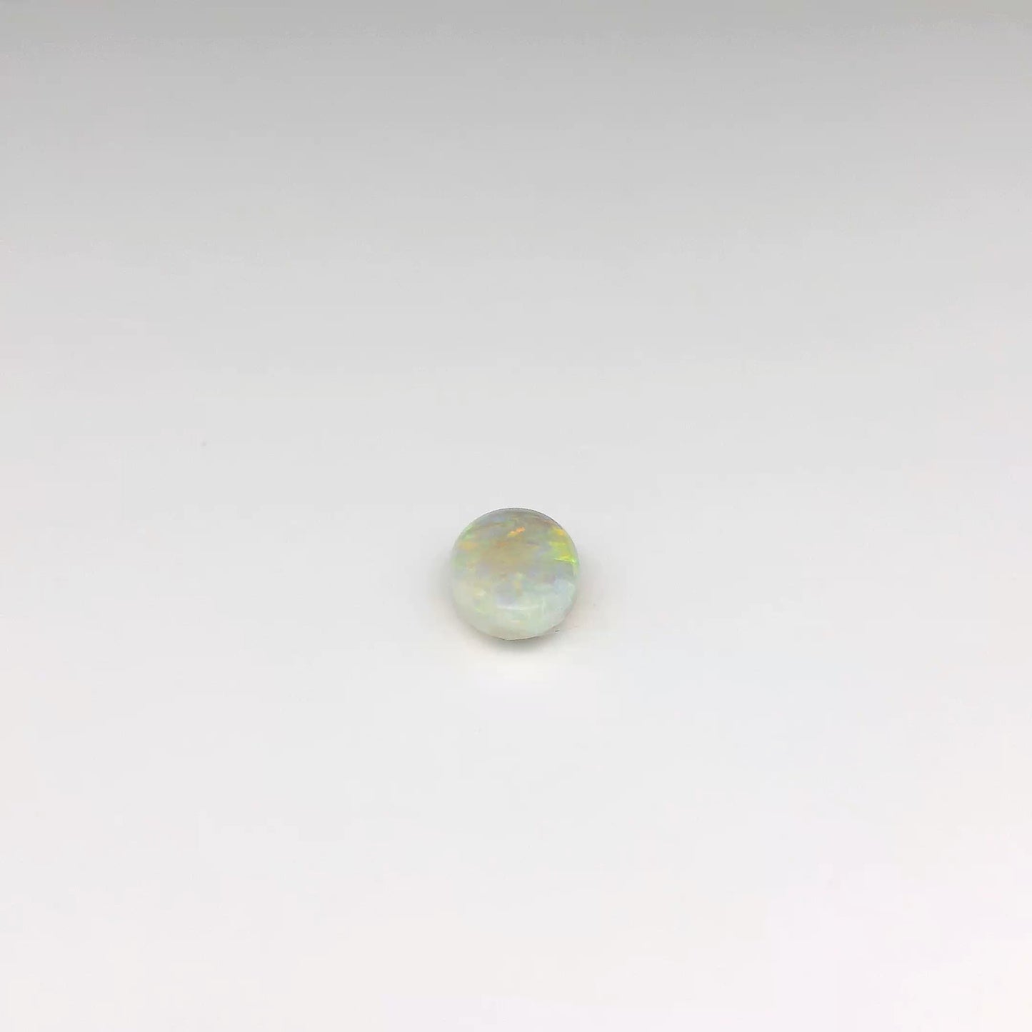 0.80ct Green, Orange Opal Gemstone