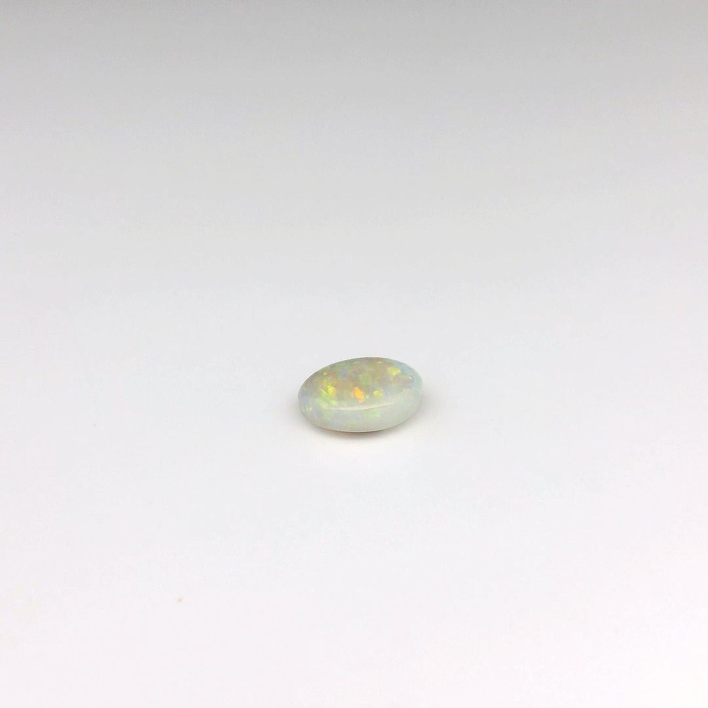 0.80ct Green, Orange Opal Gemstone
