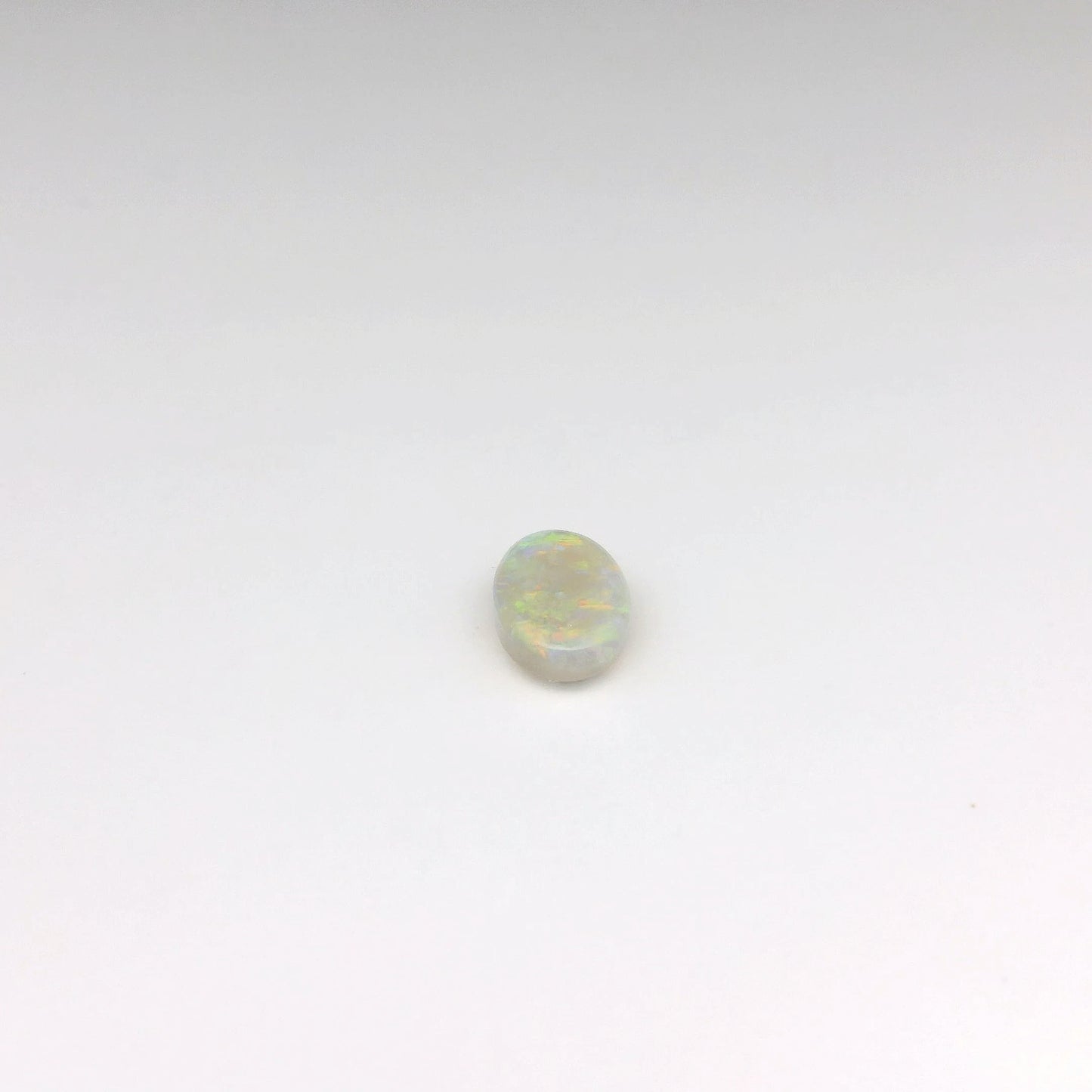 0.80ct Green, Orange Opal Gemstone