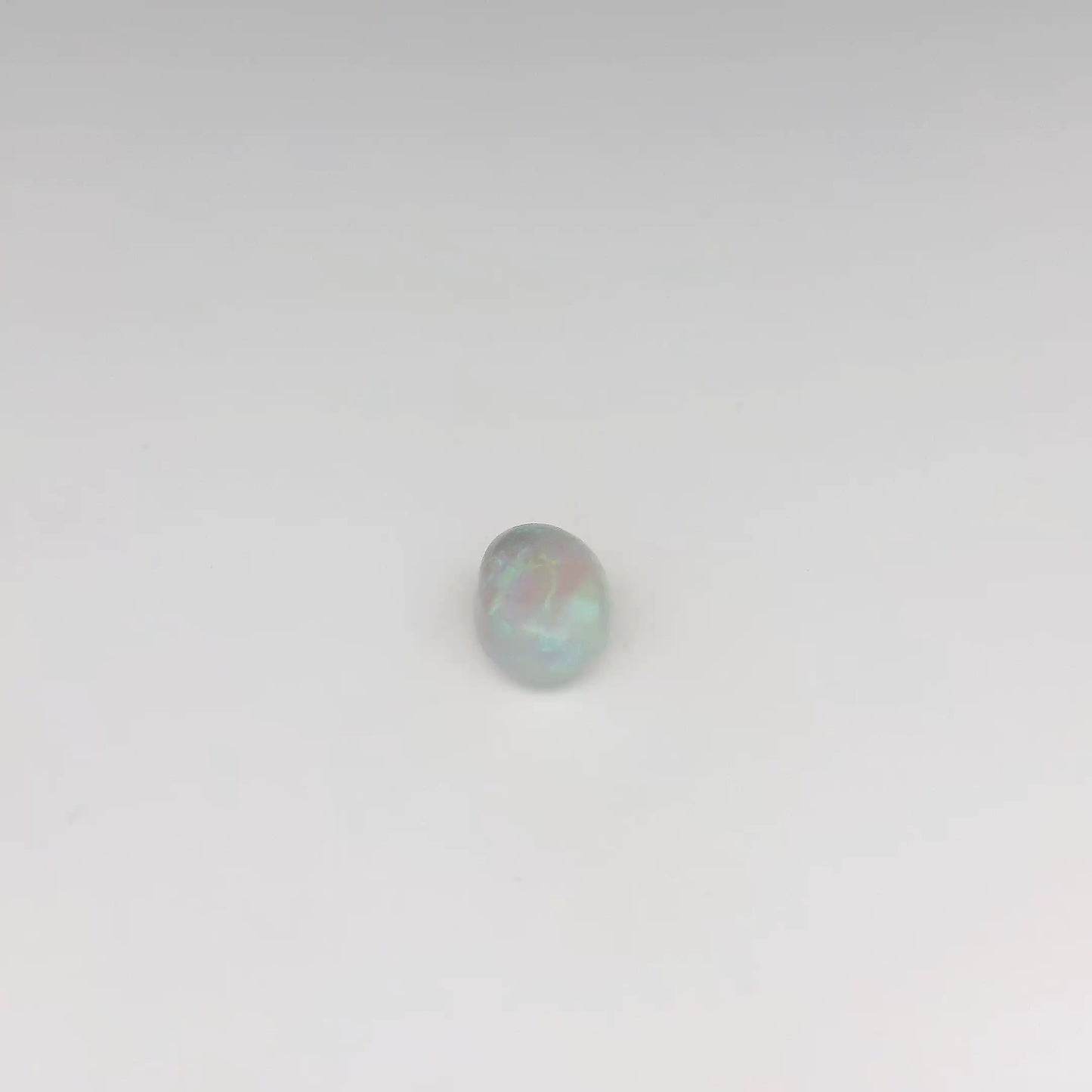 Bespoke 0.70ct Green, Orange Opal Ring