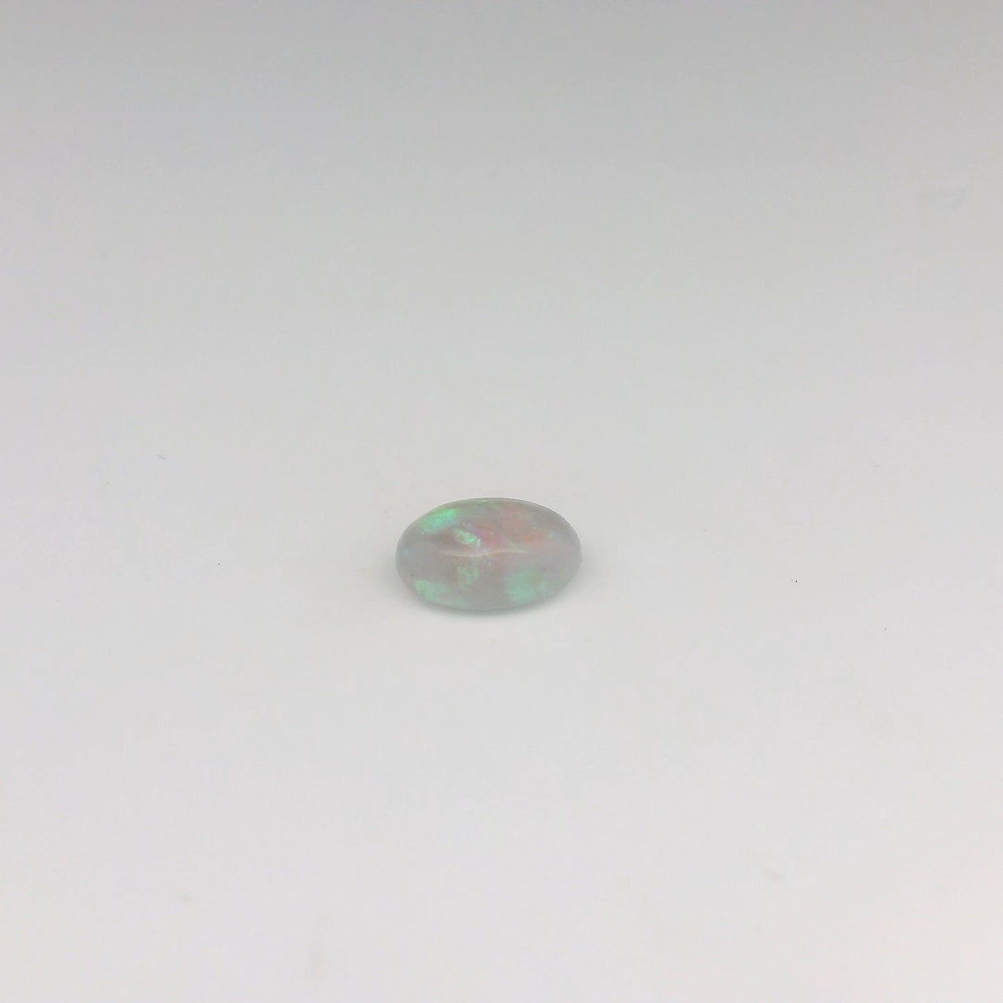 Bespoke 0.70ct Green, Orange Opal Ring