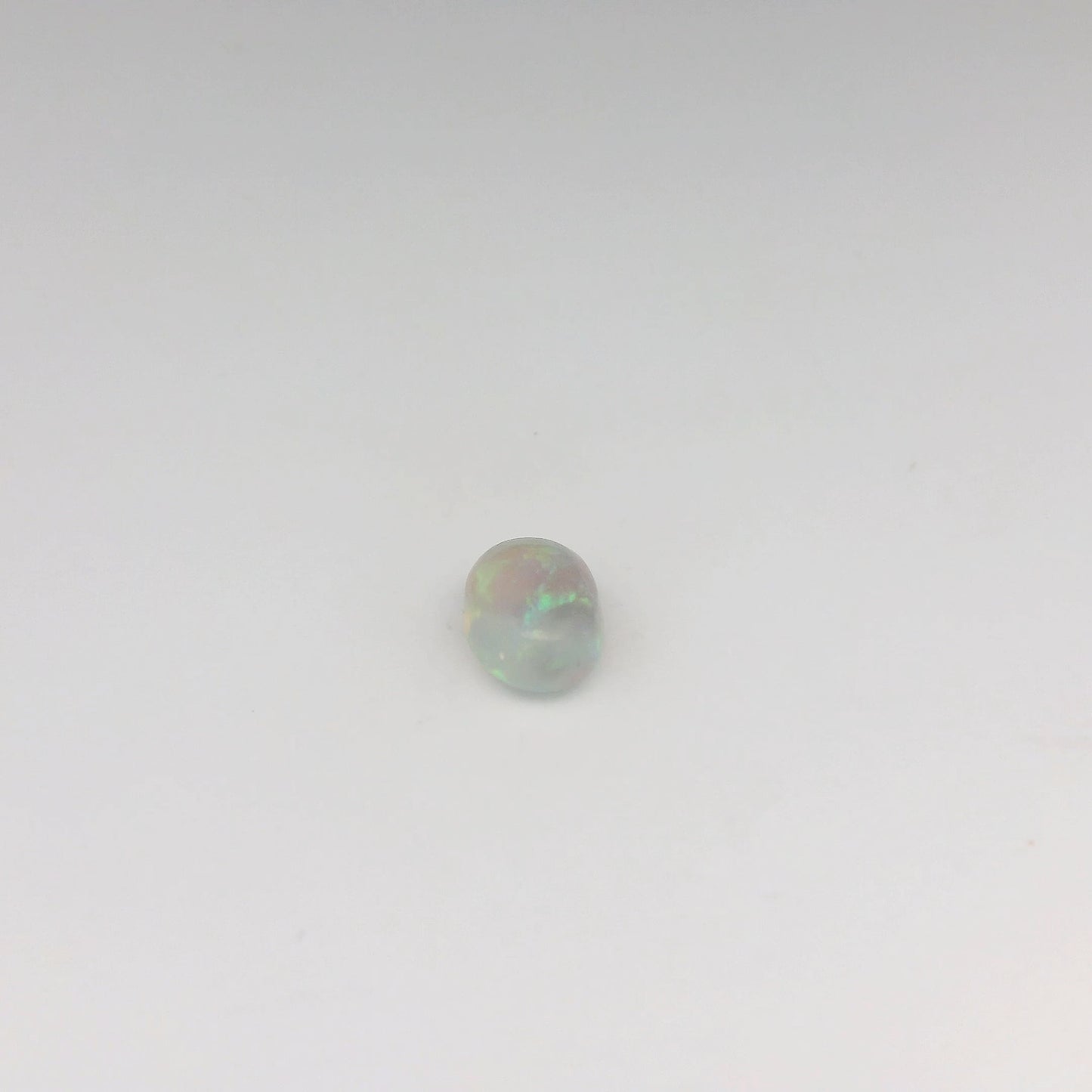 Bespoke 0.70ct Green, Orange Opal Ring
