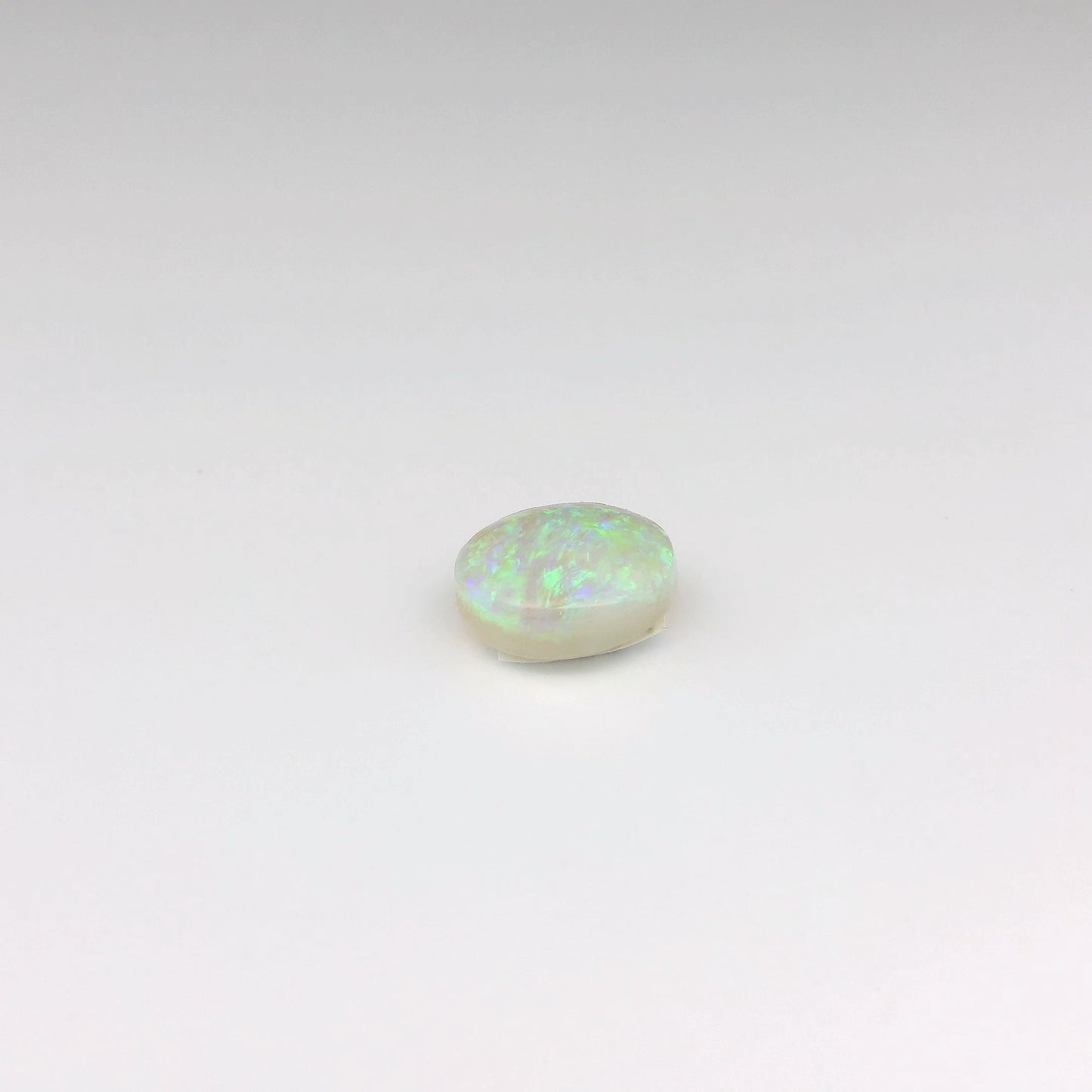 0,52ct Rode, Groene Opaal Edelsteen 