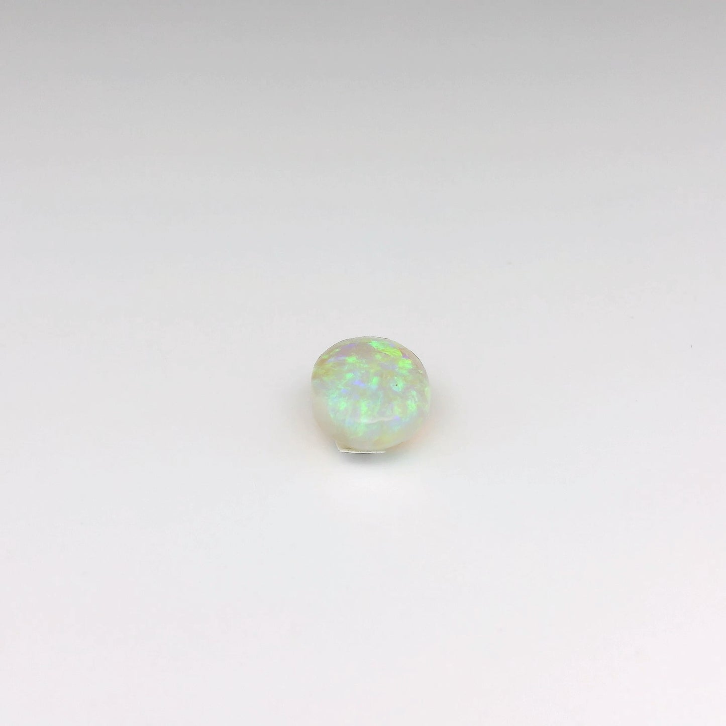 0,52ct Rode, Groene Opaal Edelsteen 