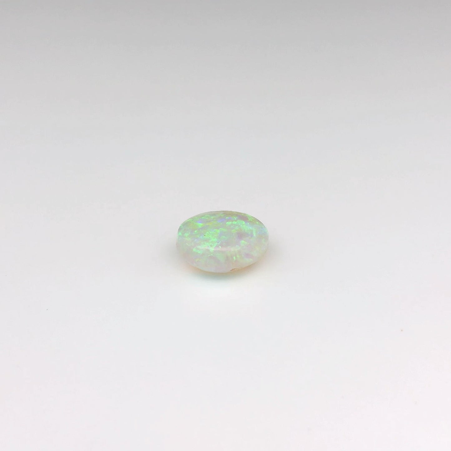 0,52ct Rode, Groene Opaal Edelsteen 