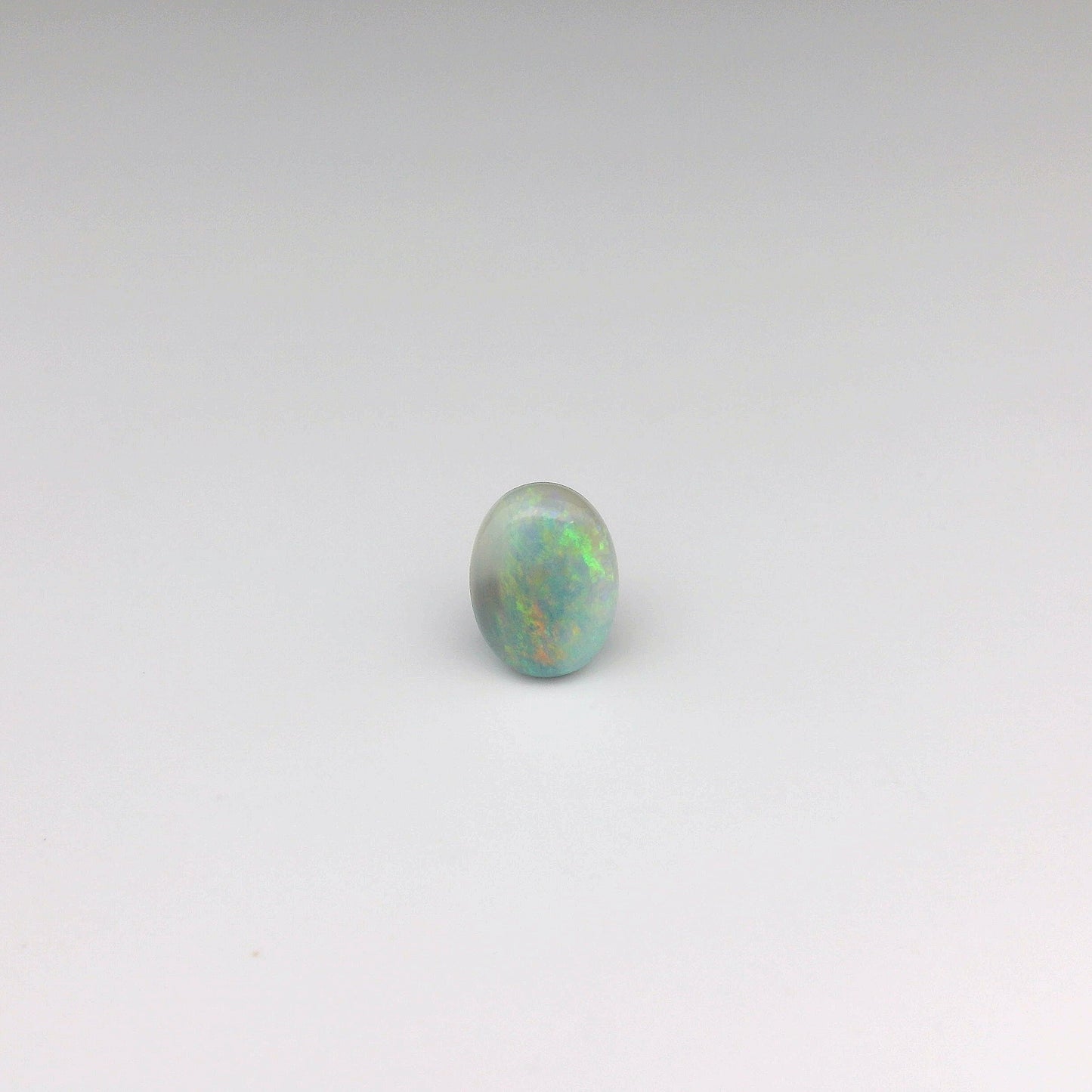 Bespoke 0.78ct Green, Orange Opal Pendant