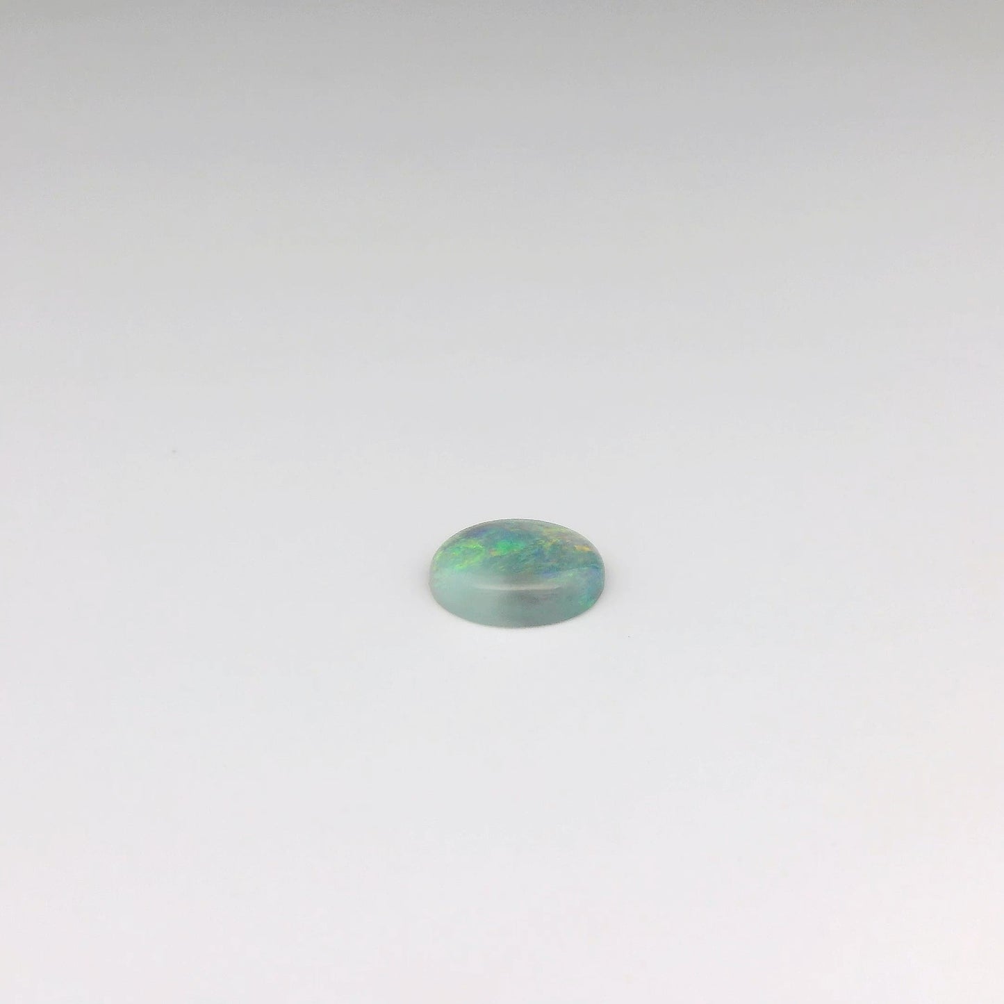 Bespoke 0.78ct Green, Orange Opal Pendant