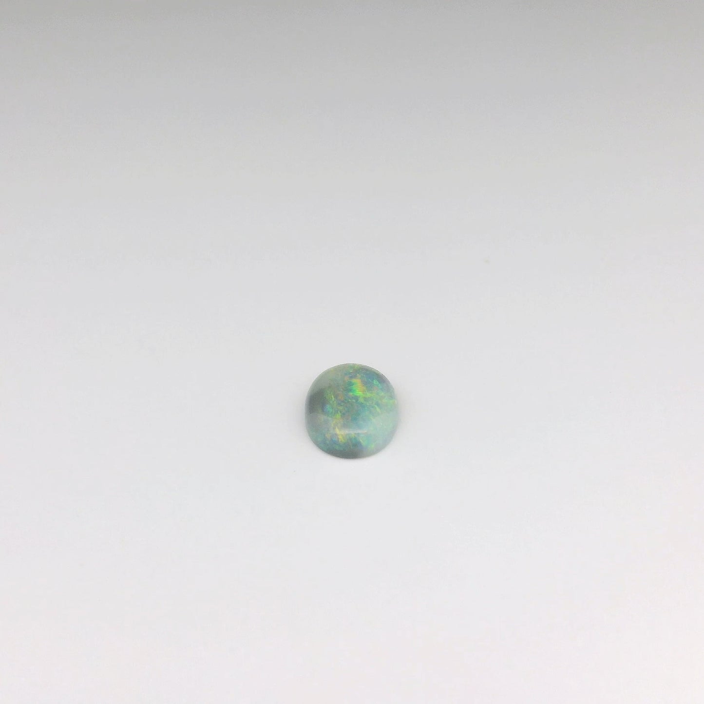 Bespoke 0.78ct Green, Orange Opal Pendant